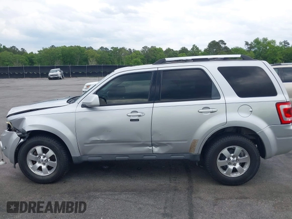 2010 Ford Escape Limited z VIN 1FMCU0E72AKD30702, wystawiony jako IAAI lot #42093802 z przebiegiem 155 572 mil mil oraz . Historia ofert i sprzedaży dostępna na DreamBid. Obrazek 14.