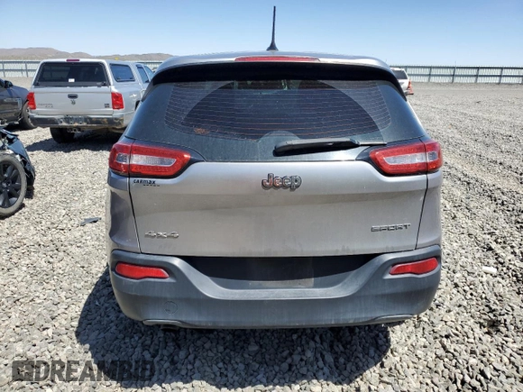2015 Jeep Cherokee Sport with VIN 1C4PJMAB9FW545249, listed as a Copart auction lot 57528075 with 158,074 mi miles and Salvage title. Bid and sale history available at DreamBid. Image 6.