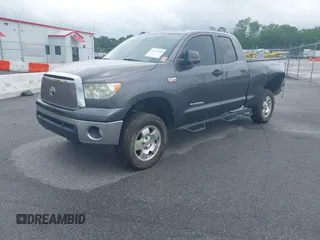 2012 Toyota Tundra z VIN 5TFUW5F10CX265994, wystawiony jako IAAI lot #42172968 z przebiegiem 197 493 mil mil oraz . Historia ofert i sprzedaży dostępna na DreamBid. Obrazek 18.