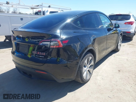 2020 Tesla Model Y Long Range with VIN 5YJYGDEE2LF059177, listed as a IAAI auction lot 41916260 with 66,190 mi miles and . Bid and sale history available at DreamBid. Image 4.