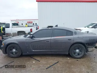 2013 Dodge Charger Police z VIN 2C3CDXAT4DH521778, wystawiony jako IAAI lot #42169438 z przebiegiem 191 907 mil mil oraz . Historia ofert i sprzedaży dostępna na DreamBid. Obrazek 14.