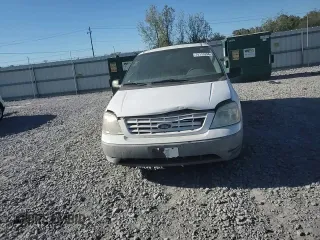 2007 Ford Freestar Cargo z VIN 2FTZA546X7BA14996, wystawiony jako Copart lot #76115294 z przebiegiem 107 450 mil mil oraz Szkody całkowita. Historia ofert i sprzedaży dostępna na DreamBid. Obrazek 12.