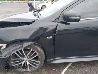 2017 Mitsubishi Lancer ES z VIN JA32V2FW6HU001870, wystawiony jako IAAI lot #42333550 z przebiegiem 75 938 mil mil oraz . Historia ofert i sprzedaży dostępna na DreamBid. Obrazek 6.