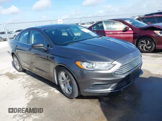 2018 Ford Fusion SE z VIN 3FA6P0HD3JR149894, wystawiony jako IAAI lot #42590703 z przebiegiem 90 589 mil mil oraz . Historia ofert i sprzedaży dostępna na DreamBid. Obrazek 1.