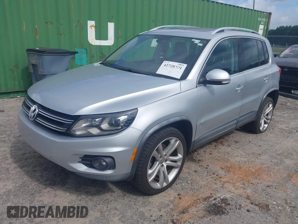 2013 Volkswagen Tiguan S with VIN WVGAV3AX9DW566269, listed as a IAAI auction lot 42728301 with 159,903 mi miles and . Bid and sale history available at DreamBid. Image 2.