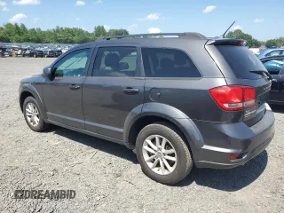 2015 Dodge Journey SXT with VIN 3C4PDDBG8FT715799, listed as a Copart auction lot 61681915 with 128,164 mi miles and Clean title. Bid and sale history available at DreamBid. Image 2.