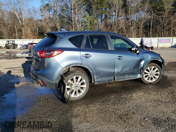 2015 Mazda CX-5 Grand Touring with VIN JM3KE2DY9F0483509, listed as a Copart auction lot 87406944 with 176,213 mi miles and Salvage Title. Bid and sale history available at carsss.com. Image 3.