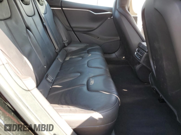 2014 Tesla Model S 60 z VIN 5YJSA1S19EFP56100, wystawiony jako Copart lot #62331725 z przebiegiem Nie podano mil oraz Szkoda całkowita • Salvage title. Historia ofert i sprzedaży dostępna na DreamBid. Obrazek 10.