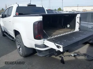 2021 Chevrolet Colorado 2WD Work Truck z VIN 1GCGSBENXM1118310, wystawiony jako IAAI lot #41668804 z przebiegiem 65 295 mil mil oraz . Historia ofert i sprzedaży dostępna na DreamBid. Obrazek 3.