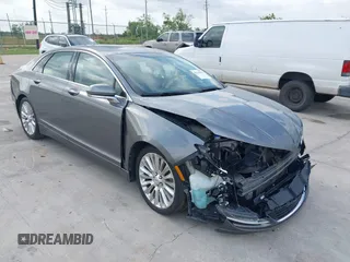 2014 Lincoln MKZ z VIN 3LN6L2G99ER834840, wystawiony jako IAAI lot #42134656 z przebiegiem 33 565 mil mil oraz . Historia ofert i sprzedaży dostępna na DreamBid. Obrazek 1.