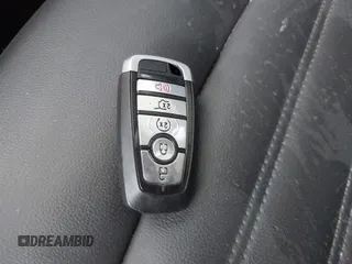 2021 Ford Edge SEL z VIN 2FMPK3J98MBA32220, wystawiony jako IAAI lot #41945825 z przebiegiem Nie podano mil oraz . Historia ofert i sprzedaży dostępna na DreamBid. Obrazek 11.