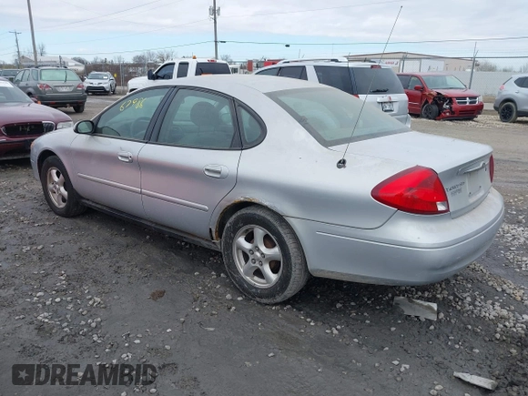 2003 Ford Taurus SES Standard with VIN 1FAFP55253A229632, listed as a IAAI auction lot 41867986 with 154,092 mi miles. Bid and sale history available at carsss.com. Image 3.