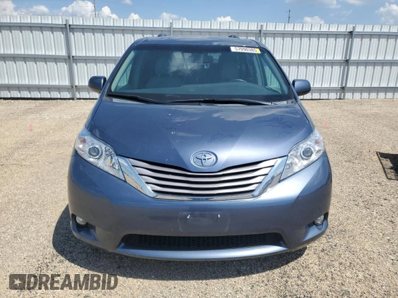 2015 Toyota Sienna XLE with VIN 5TDYK3DC4FS619385, listed as a Copart auction lot 57090385 with 112,896 mi miles and Salvage title. Bid and sale history available at DreamBid. Image 5.