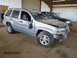 2001 Jeep Grand Cherokee Laredo with VIN 1J4GX48S61C603035, listed as a Copart auction lot 50267945 with 320,564 mi miles and Salvage title. Bid and sale history available at DreamBid. Image 4.