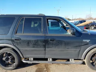 1999 Ford Expedition XLT z VIN 1FMRU1760XLB99695, wystawiony jako IAAI lot #41396676 z przebiegiem 214 434 mil mil oraz . Historia ofert i sprzedaży dostępna na DreamBid. Obrazek 13.