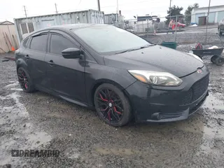 2014 Ford Focus ST with VIN 1FADP3L91EL441379, listed as a IAAI auction lot 41092598 with 58,670 mi miles and . Bid and sale history available at carsss.com. Image 1.