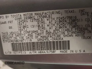 2013 Toyota Tacoma with VIN 5TFUU4EN0DX071116, listed as a IAAI auction lot 41647546 with 243,898 mi miles and . Bid and sale history available at DreamBid. Image 9.