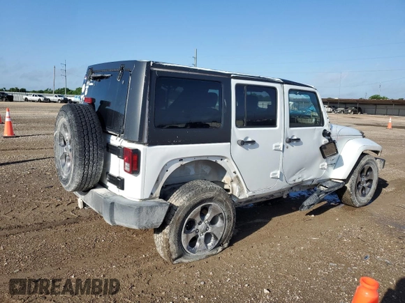 2016 Jeep Wrangler Unlimited Sahara with VIN 1C4BJWEG6GL301301, listed as a Copart auction lot 54362595 with 110,295 mi miles and Salvage title. Bid and sale history available at DreamBid. Image 3.