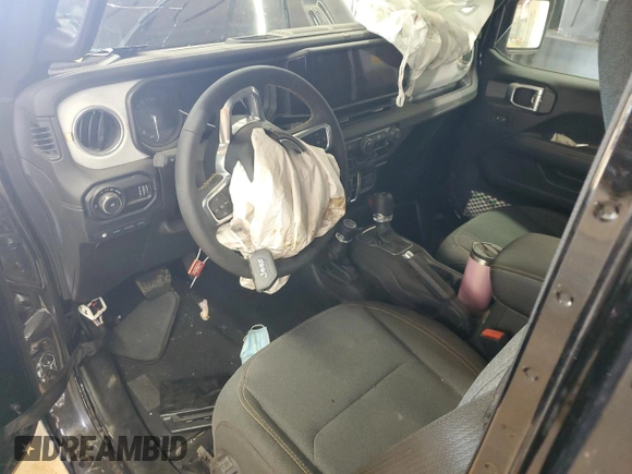 2024 Jeep Wrangler Sahara with VIN 1C4RJXP67RW292134, listed as a Copart auction lot 60993555 with 10,038 mi miles and Salvage title. Bid and sale history available at DreamBid. Image 8.
