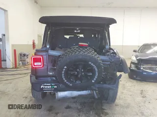 2021 Jeep Wrangler Unlimited Sport S with VIN 1C4HJXDN8MW744768, listed as a IAAI auction lot 41894327 with 47,826 mi miles and . Bid and sale history available at DreamBid. Image 16.