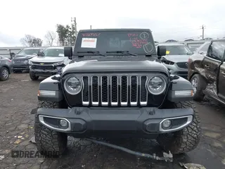 2022 Jeep Gladiator High Altitude z VIN 1C6HJTFG1NL164764, wystawiony jako IAAI lot #41727357 z przebiegiem 28 222 mil mil oraz . Historia ofert i sprzedaży dostępna na DreamBid. Obrazek 12.