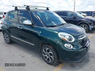 2014 FIAT 500L Lounge with VIN ZFBCFACH2EZ002907, listed as a IAAI auction lot 42604663 with 112,284 mi miles and . Bid and sale history available at DreamBid. Image 1.