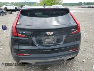 2019 Cadillac XT4 FWD Premium Luxury z VIN 1GYFZCR49KF147242, wystawiony jako Copart lot #55483215 z przebiegiem 94 990 mil mil oraz Szkody całkowita. Historia ofert i sprzedaży dostępna na DreamBid. Obrazek 6.