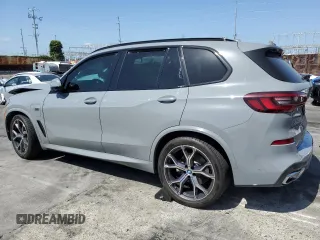 2023 BMW X5 xDrive45e with VIN 5UXTA6C0XP9P49482, listed as a Copart auction lot 56730735 with Not provided miles and Salvage title. Bid and sale history available at DreamBid. Image 2.