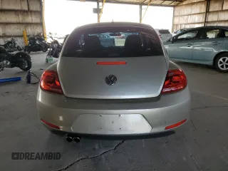 2012 Volkswagen Beetle 2.5L with VIN 3VWHX7AT5CM643314, listed as a Copart auction lot 58843455 with 72,448 mi miles and Salvage title. Bid and sale history available at DreamBid. Image 6.