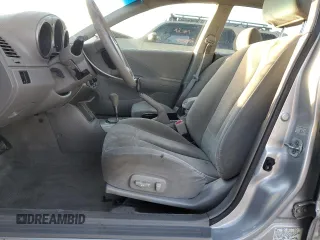 2003 Nissan Altima SE with VIN 1N4BL11D03C142767, listed as a Copart auction lot 41680035 with 216,963 mi miles and Salvage title. Bid and sale history available at DreamBid. Image 7.