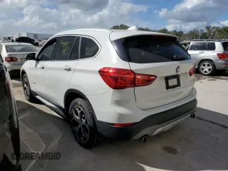 2018 BMW X1 sDrive28i with VIN WBXHU7C38J5H40248, listed as a Copart auction lot 66158662 with 59,903 mi miles. Bid and sale history available at carsss.com. Image 3.