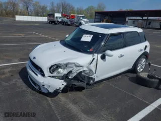2016 MINI Cooper Countryman S with VIN WMWZC3C51GWT10458, listed as a IAAI auction lot 41878799 with 112,019 mi miles. Bid and sale history available at carsss.com. Image 17.