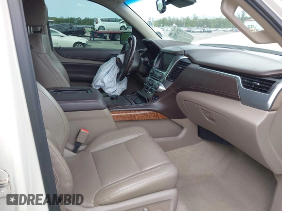 2015 Chevrolet Suburban LTZ with VIN 1GNSKKKC4FR687923, listed as a IAAI auction lot 42192062 with 139,873 mi miles and . Bid and sale history available at DreamBid. Image 5.