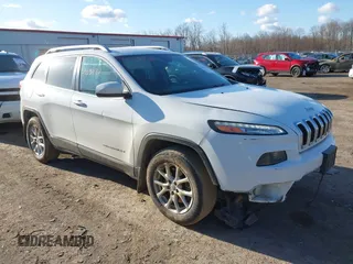 2016 Jeep Cherokee Latitude with VIN 1C4PJMCB1GW204412, listed as a IAAI auction lot 42031132 with 228,442 mi miles and . Bid and sale history available at carsss.com. Image 1.