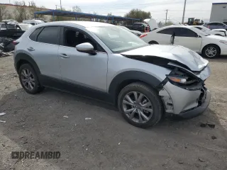 2021 Mazda CX-30 Select with VIN 3MVDMABLXMM256327, listed as a Copart auction lot 51185235 with 76,630 mi miles and Salvage Title. Bid and sale history available at DreamBid. Image 4.