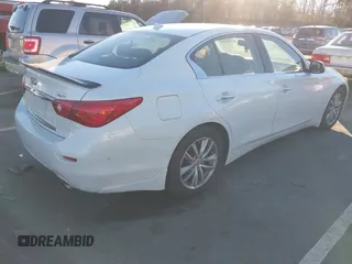 2014 Infiniti Q50 Hybrid Sport with VIN JN1AV7AP5EM690406, listed as a IAAI auction lot 41306387 with 143,309 mi miles and . Bid and sale history available at DreamBid. Image 4.