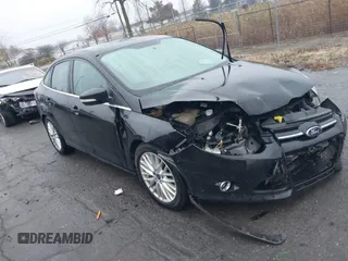 2014 Ford Focus Titanium with VIN 1FADP3J24EL439065, listed as a IAAI auction lot 40868973 with 167,739 mi miles. Bid and sale history available at carsss.com. Image 1.