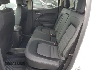 2022 GMC Canyon 4WD AT4 z VIN 1GTG6FEN0N1164841, wystawiony jako Copart lot #54440155 z przebiegiem 31 658 mil mil oraz Szkoda całkowita • Salvage title. Historia ofert i sprzedaży dostępna na DreamBid. Obrazek 10.