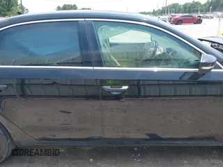 2015 Volkswagen Passat SE z VIN 1VWBV7A33FC024325, wystawiony jako IAAI lot #42313126 z przebiegiem 179 964 mil mil oraz . Historia ofert i sprzedaży dostępna na DreamBid. Obrazek 14.
