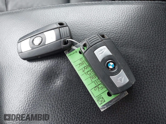 2011 BMW 3 Series 335i with VIN WBADX7C52BE581856, listed as a IAAI auction lot 41911781 with 130,606 mi miles and . Bid and sale history available at DreamBid. Image 11.