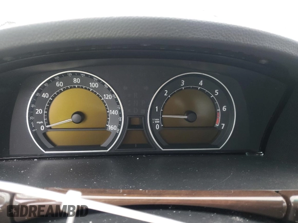 2006 BMW 7 Series 750Li z VIN WBAHN83516DT59723, wystawiony jako Copart lot #61220845 z przebiegiem Nie podano mil oraz Szkoda całkowita • Salvage title. Historia ofert i sprzedaży dostępna na DreamBid. Obrazek 9.