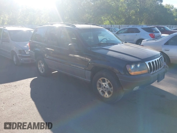 1999 Jeep Grand Cherokee Laredo with VIN 1J4GW58S0XC538913, listed as a IAAI auction lot 42684467 with 241,252 mi miles and . Bid and sale history available at DreamBid. Image 1.