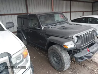 2021 Jeep Wrangler Unlimited Rubicon with VIN 1C4JJXFM6MW538774, listed as a IAAI auction lot 42368651 with 49,490 mi miles and . Bid and sale history available at DreamBid. Image 13.
