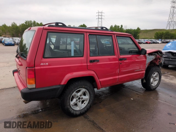 1999 Jeep Cherokee Sport with VIN 1J4FF68S2XL648735, listed as a Copart auction lot 58758115 with 252,248 mi miles and Salvage title. Bid and sale history available at DreamBid. Image 3.