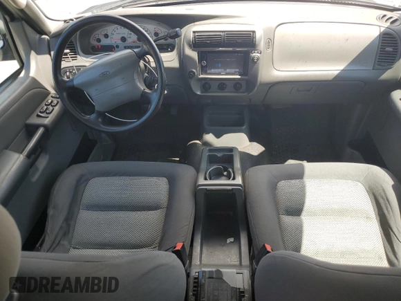 2005 Ford Explorer Sport Trac XLS с VIN 1FMZU67K85UA18120, выставлен на аукционе Copart как лот 64631455 с пробегом 180 021 миль миль и Списание • Salvage title. История ставок и продаж доступна на DreamBid. Изображение 8.