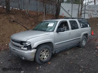 2006 Chevrolet Suburban LT with VIN 1GNFK16Z86J171637, listed as a IAAI auction lot 41919762 with 231,041 mi miles. Bid and sale history available at carsss.com. Image 2.