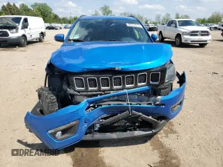2020 Jeep Compass North z VIN 3C4NJDBB9LT255410, wystawiony jako Copart lot #56552915 z przebiegiem 38 959 mil mil oraz Szkoda całkowita • Salvage title. Historia ofert i sprzedaży dostępna na DreamBid. Obrazek 5.