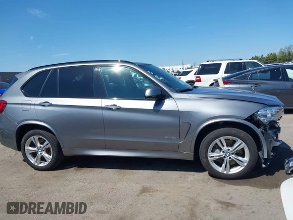 2015 BMW X5 xDrive50i z VIN 5UXKR6C59F0J76691, wystawiony jako IAAI lot #41857319 z przebiegiem 32 830 mil mil oraz . Historia ofert i sprzedaży dostępna na DreamBid. Obrazek 14.