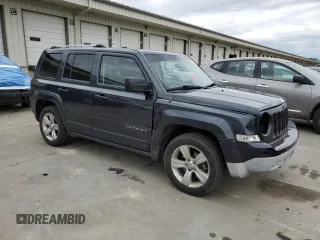 2014 Jeep Patriot Limited with VIN 1C4NJPCB9ED900811, listed as a Copart auction lot 58061115 with 230,415 mi miles and Salvage title. Bid and sale history available at DreamBid. Image 4.