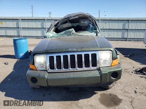 2007 Jeep Commander Sport with VIN 1J8HG48K27C663745, listed as a Copart auction lot 75741314 with 194,534 mi miles and Salvage Title. Bid and sale history available at carsss.com. Image 5.